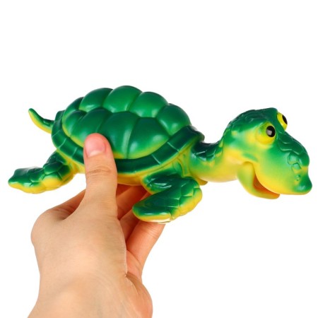 Rubber toy tortoise bathtub, with a squeak, crush me