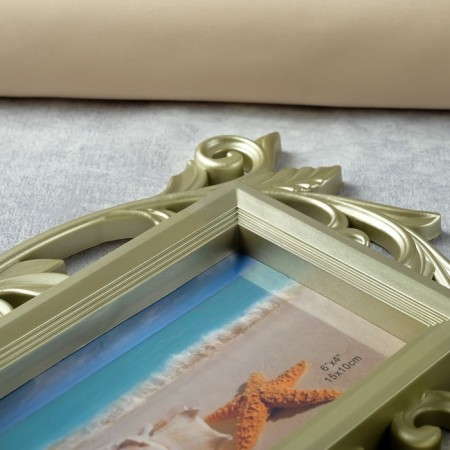 Photo frame plastic in 6 photos 10x15 cm "Vyun" gold 55x33 cm-2