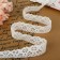 Knitted lace, 27 ± 3 mm × 2.7 ± 0.5 m, white color