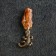 Talisman's keychain "Lizard", brass, amber