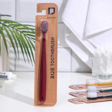 A toothbrush with a wide cleaning head and super -tank bristles, Japanese style, mix