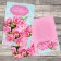 A postcard with a pink bouquet for money, 19 x 29 cm
