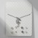 Set of 5 objects: 4 pairs fluffs, the pendant "dolphin", white color in silver, 45 cm