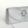 Female bag on a magnet, silver color