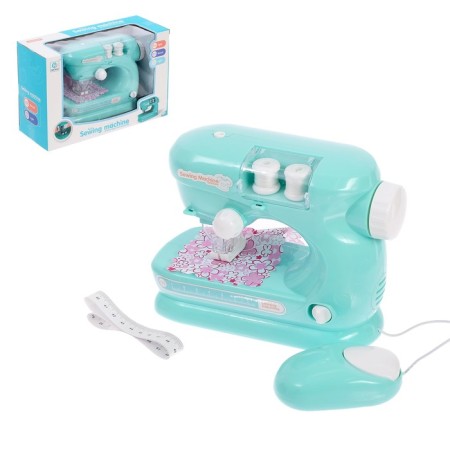The sewing machine "Mint" with coils, the foot moves, light and sound effects