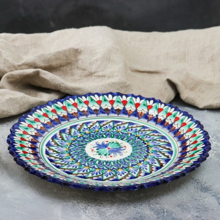Plate of the Rishtan ceramics "Flowers", blue, embossed, 27cm