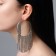 Hanging earrings with rhinestones "Waterfall" threads on large rings, white color in silver, 12 cm