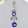 Suspension from the evil eye "Filin with flower" 16.5 cm