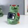 Souvenir Ceramics Light "Green Filin with Flower" from the solar battery 13.5x9.5 cm
