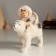 Souvenir Polystone "A child on a white bear" 13.5x6x12.5 cm
