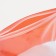 Cosmetic bag with zip-gl, transparent/orange color