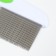 A comb for wool 15.6 x 5.3 cm, long teeth 3.4 cm, white-green