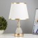 Board lamp “Carolina” E27 40W gold 22x22x34.5 cm