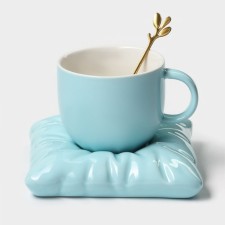 Tea couple ceramic with a spoon 