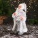 Santa Claus "in a high cap, in a strap and with a bag" 30 cm, silver-white