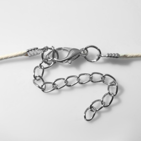 The pendant "Ice Heart" on the threads, a Christmas tree, white color in silver on a beige lace, 30 cm-2