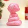 New Year. Symbol 2025. Figure soap "snake" pink with silver