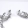 Hanging earrings with rhinestones "Firebird" with drops on a chain, white color in silver, 7 cm