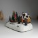 Souvenir plastic light "Santa Claus decorates the Christmas tree" is spinning 26.5x16x17.5 cm
