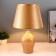 The table lamp "only" E27 40W gold is 22x22x34cm Risalux