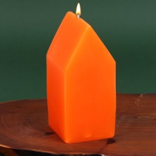 A candle in the shape of a house, mix, without aroma, 6 x 6 x 12.5 cm.