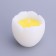Decorative candle "Egg with yolk"