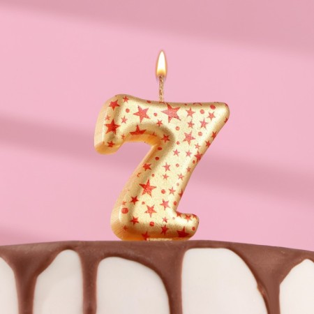 Candle in the Sanata cake, number "7", gold with red stars, 5.5 cm