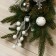 The coniferous composition "Cozy fairy tale" 50 cm, beige bow