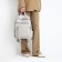 Women's backpack made of artificial leather with lightning, 6 outer pockets, beige color