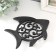 Souvenir of cast iron stand "Fish in patterns" 19x16.5 cm
