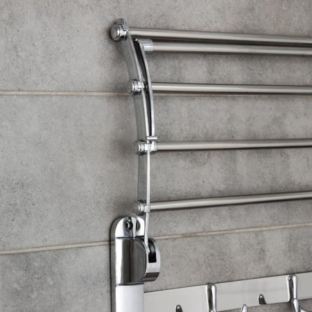 The shelf is hinged with a holder of towels, 4 double hooks, 59.5 × 26 × 14 cm, color chromium-5