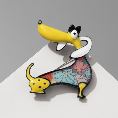 Cartoon brooch "Dog" of a dachshund, colored in ferrous metal