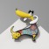 Cartoon brooch "Dog" of a dachshund, colored in ferrous metal