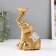 Polystone candlestick for 1 candle "Sitting elephant with a trunk up" 7.5x10.5x16.2 cm