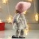 Interior doll "Girl in a pink hat with ears and white fur coat" 27x10x17 cm