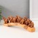 Polystone souvenir "Seven elephants on a tusk" under a tree 4.6x29x10 cm
