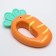 A rattle of a “vegetable mix, crush me: carrot”, color mix, crush me