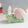 Polystone souvenir "Girl in a fluffy pink hat lies with a poodle on her back" 13.5x9x9 cm