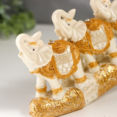 Polystone souvenir "Seven white elephants in golden blankets on a carved tusk" 11x3.5x28.5 cm-4