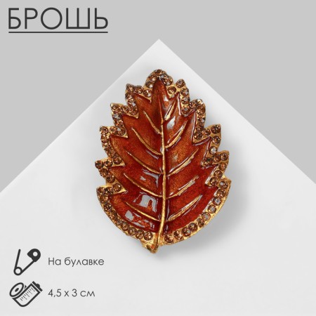 Alkha's “leaf” brooch, brown color in matte gold