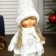 Interior doll "Valya girl in a beige sweater and cap" 38x10x14 cm
