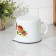 A mug with a nose, 1 l, with a lid, a mix neckline, white color
