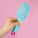 The comb is massage, wide, ventilated, 8 × 24.5 cm, color mix