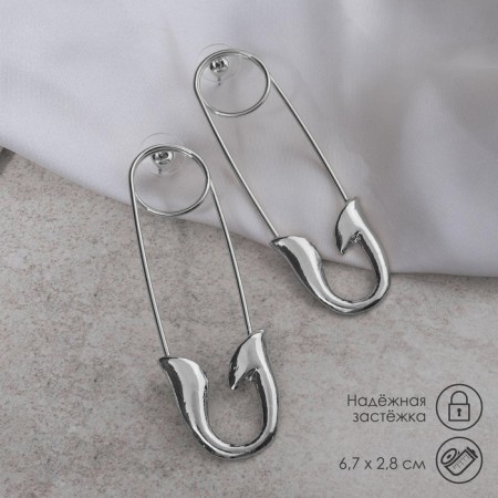Earrings of the Modern pins, silver color