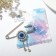 Pin-shaped "from the evil eye" of the eye with pendants, 5 cm, white-blue color in silver