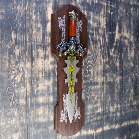 A souvenir sword on a tablet, a carved blade with a pattern, the claws of the eagle on the handle, the blade 41 cm-1