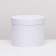 The box is round, white, 25 x 20 cm