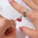 A set of rings 2 pieces of “lovemates” on a magnet, heart, red-silver color, dimensionless