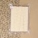 Knitted lace, 22 mm × 10 ± 1 m, beige color