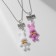 Kuulons "Uzolnutor" hares, white-pink color in silver, 40 cm